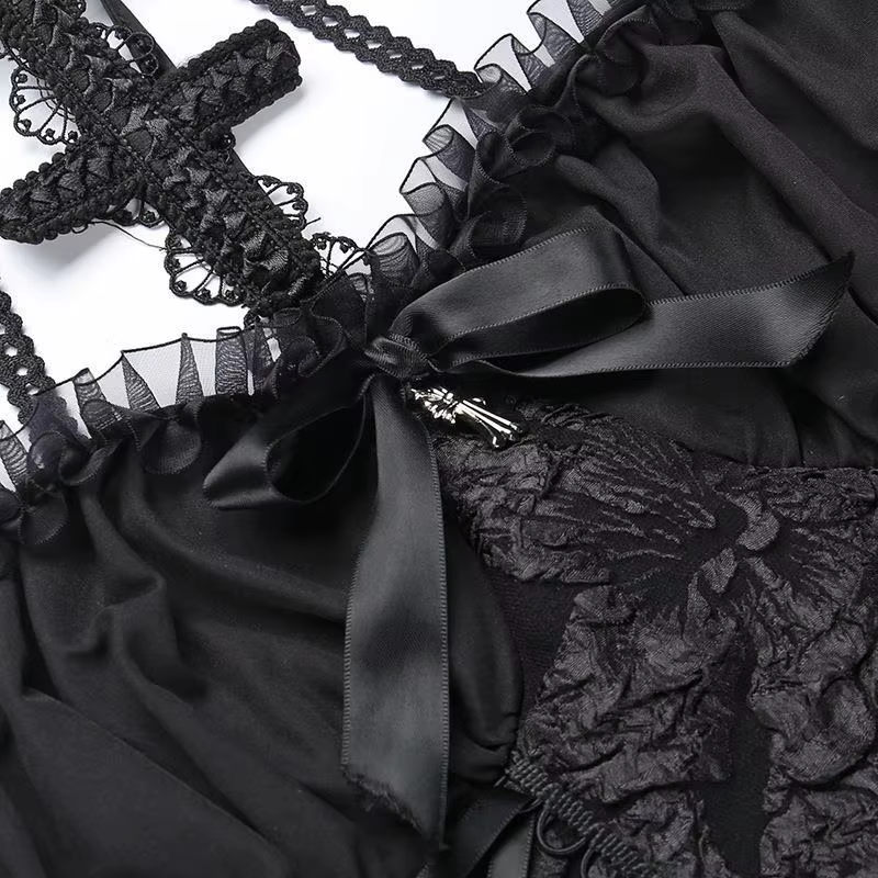 Close-up of the decorative black bow and raised jacquard pattern